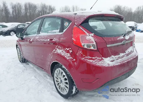 2014 Ford Fiesta Titanium z USA, uszkodzony, nr VIN 3FADP4FJ0EM162936